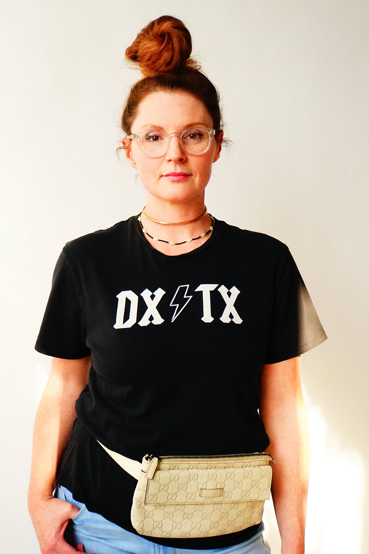 Model wearing the DX/TX t-shirt with accessories