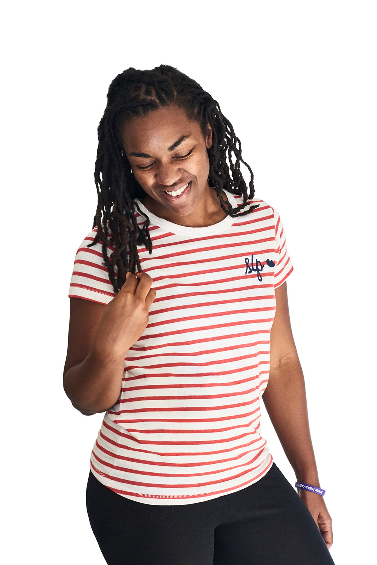 Model wearing the women's slim fit The Stripes t-shirt in white and red