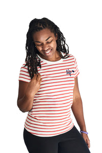 Model wearing the women's slim fit The Stripes t-shirt in white and red